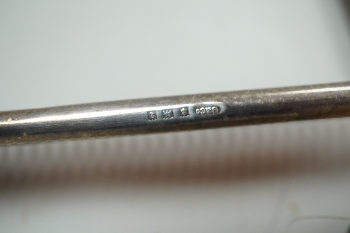 An Elizabeth II engine turned silver Art Deco style four pieced dressing table mirror, brush and comb set, W.I. Broadway & Co, Birmingham, 1961/63/65, mirror 27.8cm.